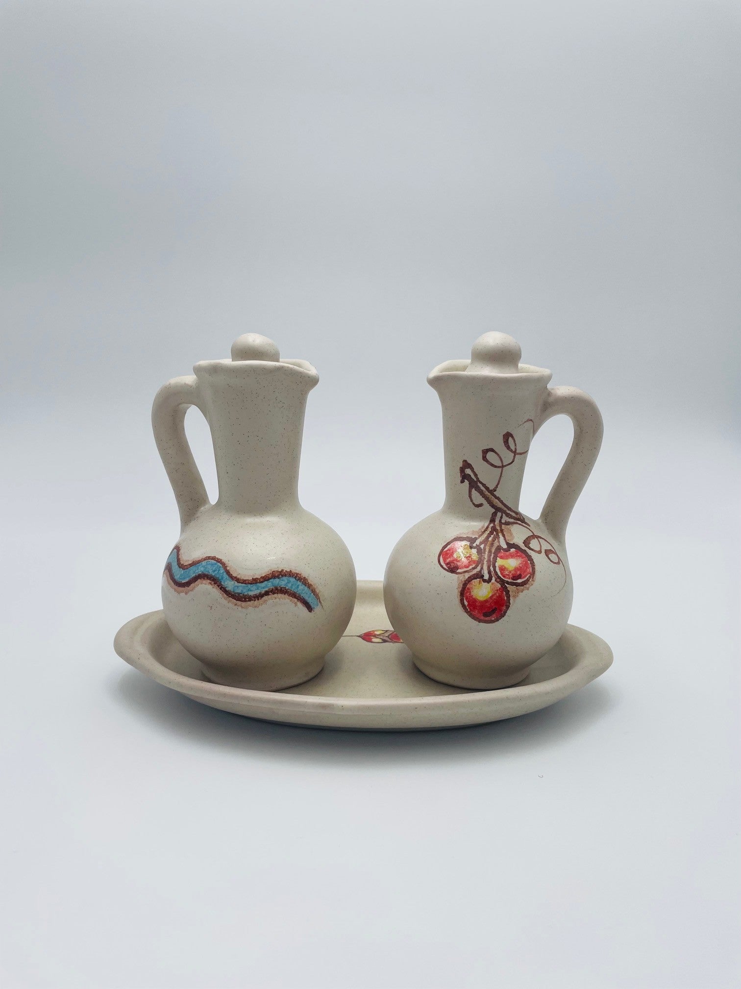 Ampolline ceramica con disegno acqua e uva