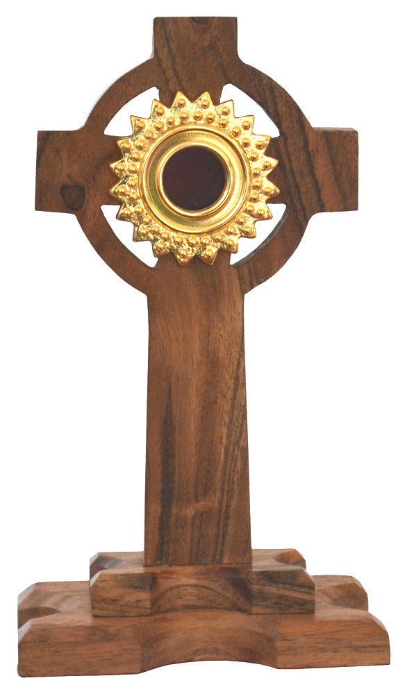 Reliquiario in legno a croce con teca in ottone dorato